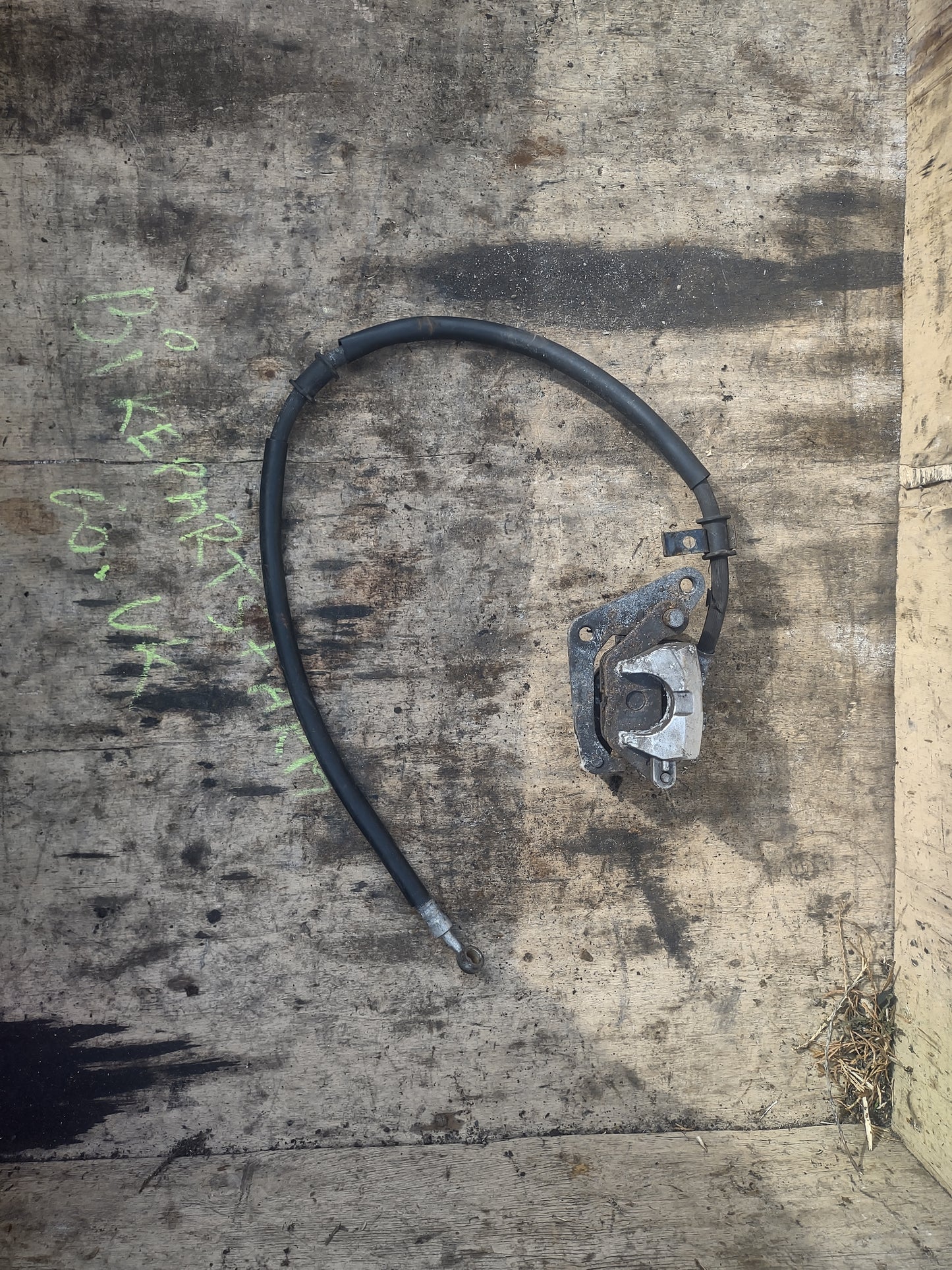 Yamaha YBR 125 front brake caliper (used)