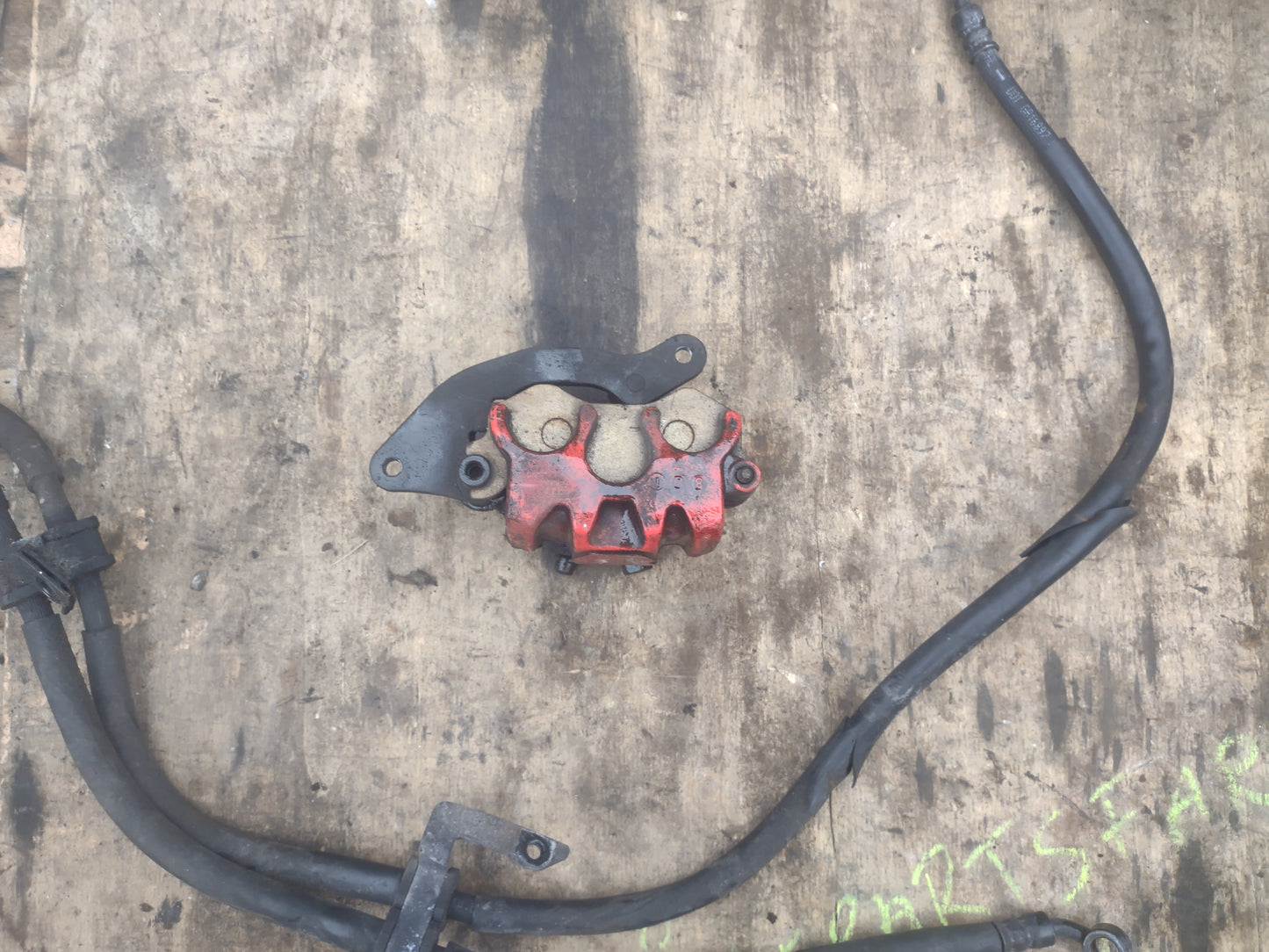 Honda ANC 125 / SH MODE 125 front brake calliper and hoses (OEM) used