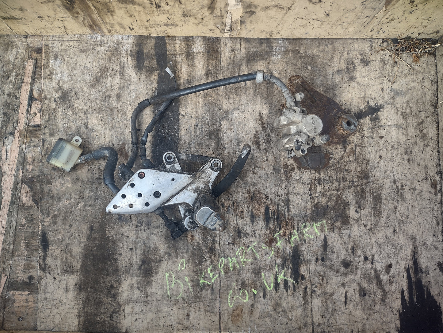 Honda CBR 125 R brake pedal assembly and calliper