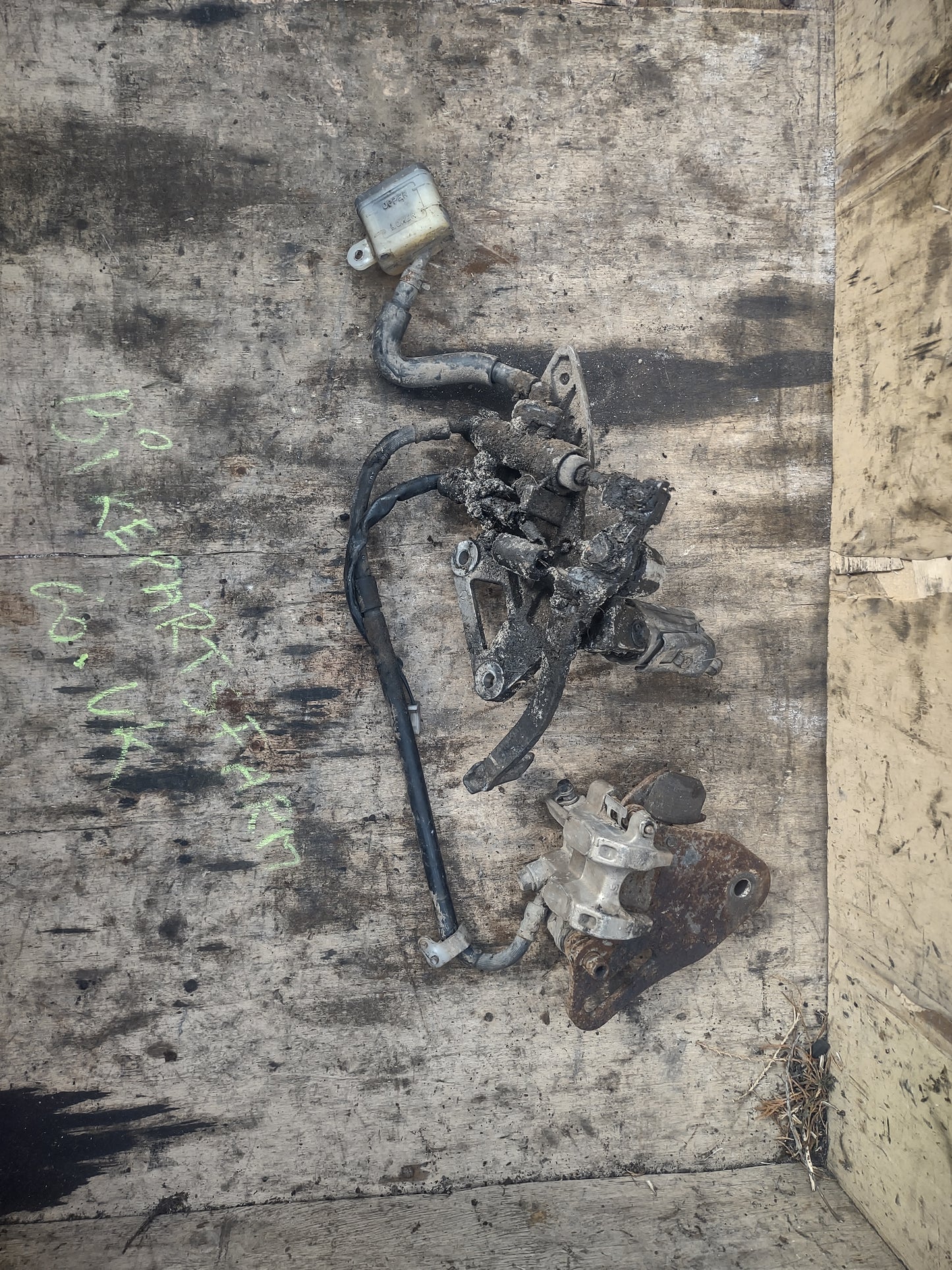Honda CBR 125 R brake pedal assembly and calliper