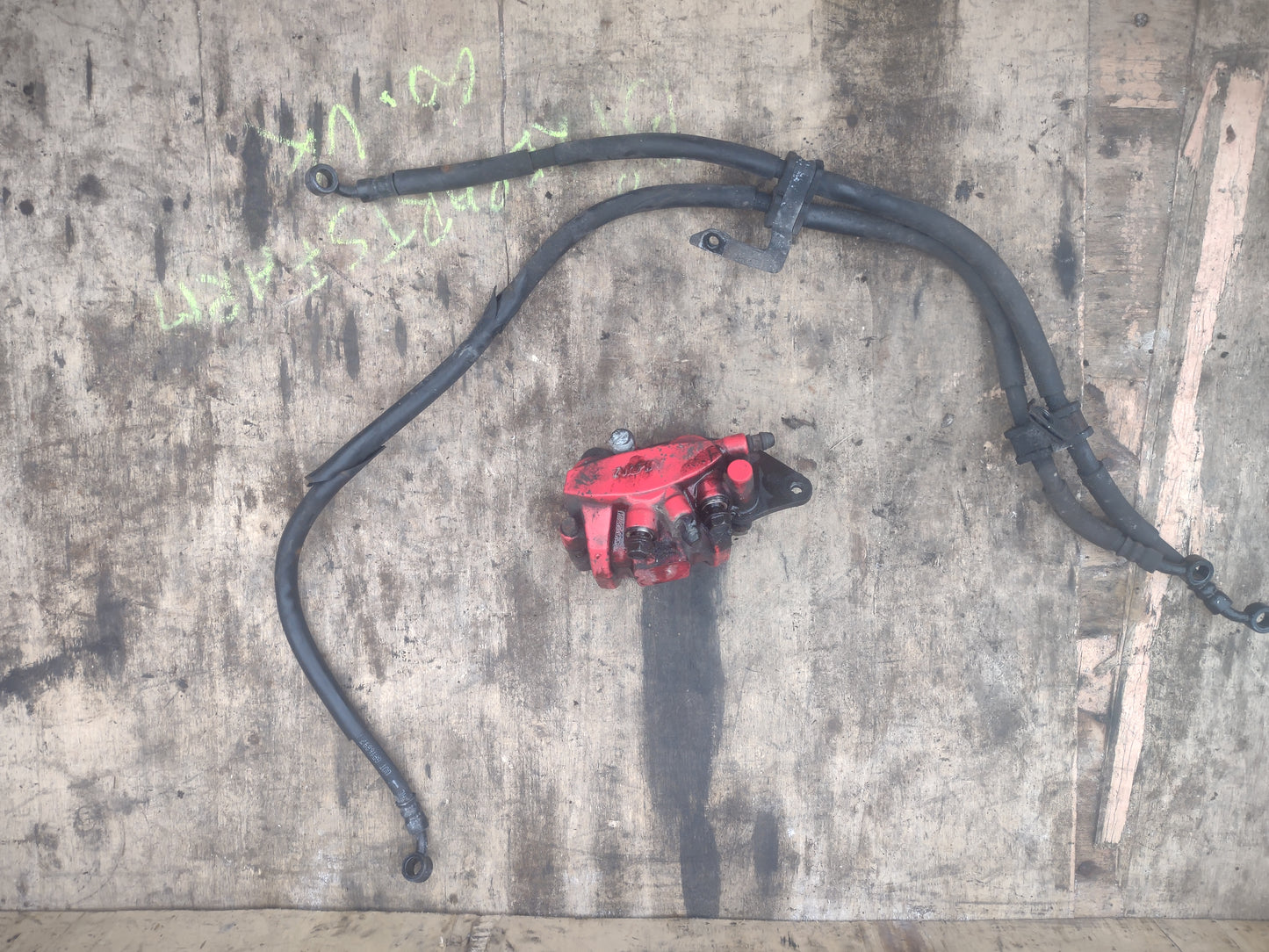 Honda ANC 125 / SH MODE 125 front brake calliper and hoses (OEM) used