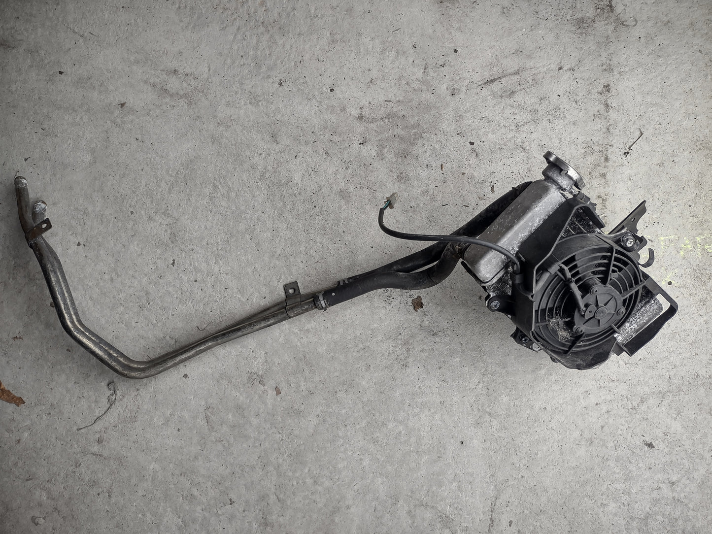 Honda PES 125 ps 125 radiator and fan (OEM)